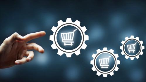 Purchasing concept visualization. A hand extends out from the left to meet 3 gears, all with shopping carts inside of them.