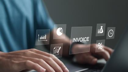 E-invoice and online digital statements concept. Person using computer laptop with invoice icons on virtual screen.